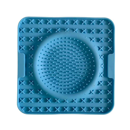 Blue silicone dog lick mat with raised textures for enrichment and mental stimulation by  Paws In Earnest