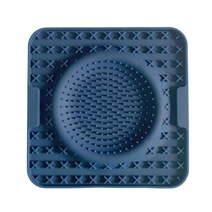 Navy silicone dog lick mat with raised textures for enrichment and mental stimulation by  Paws In Earnest